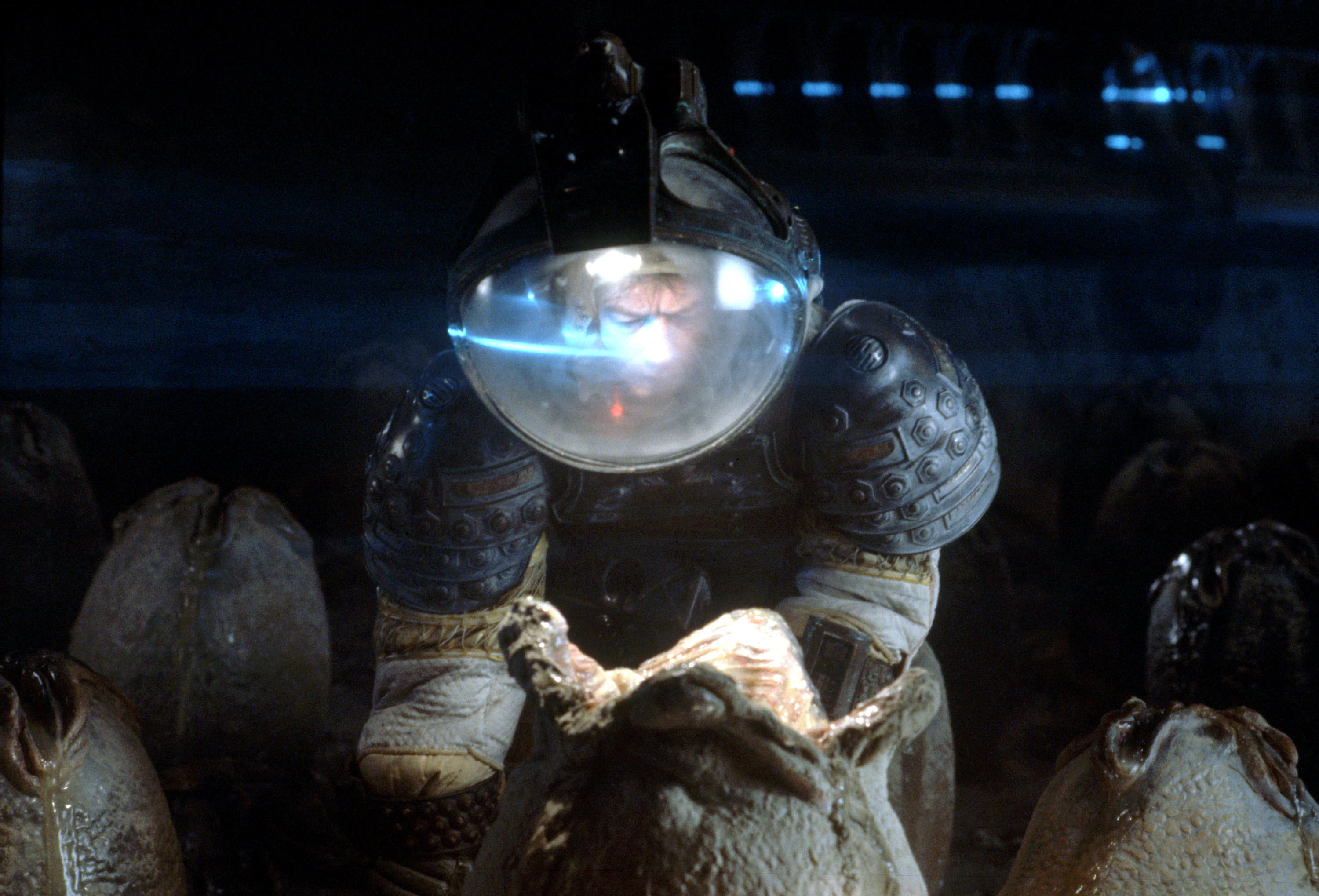 Scene from Alien with John Hurt exploring alien eggs.